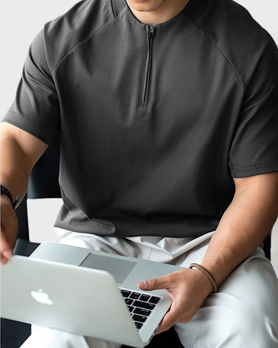 Men’s breathable quarter-zip with mesh underarm for moisture-wicking performance