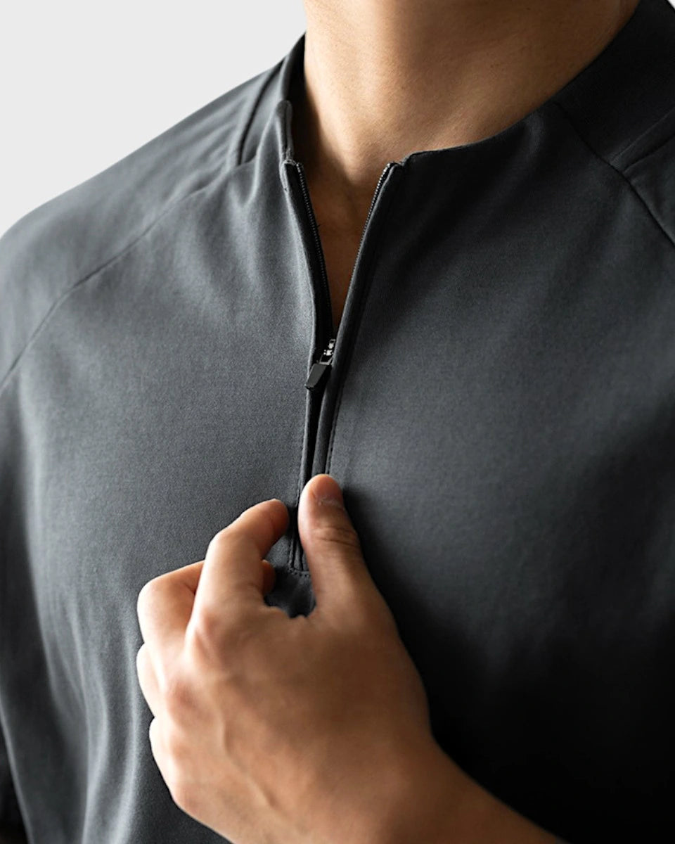 Men’s breathable quarter-zip with mesh underarm for moisture-wicking performance