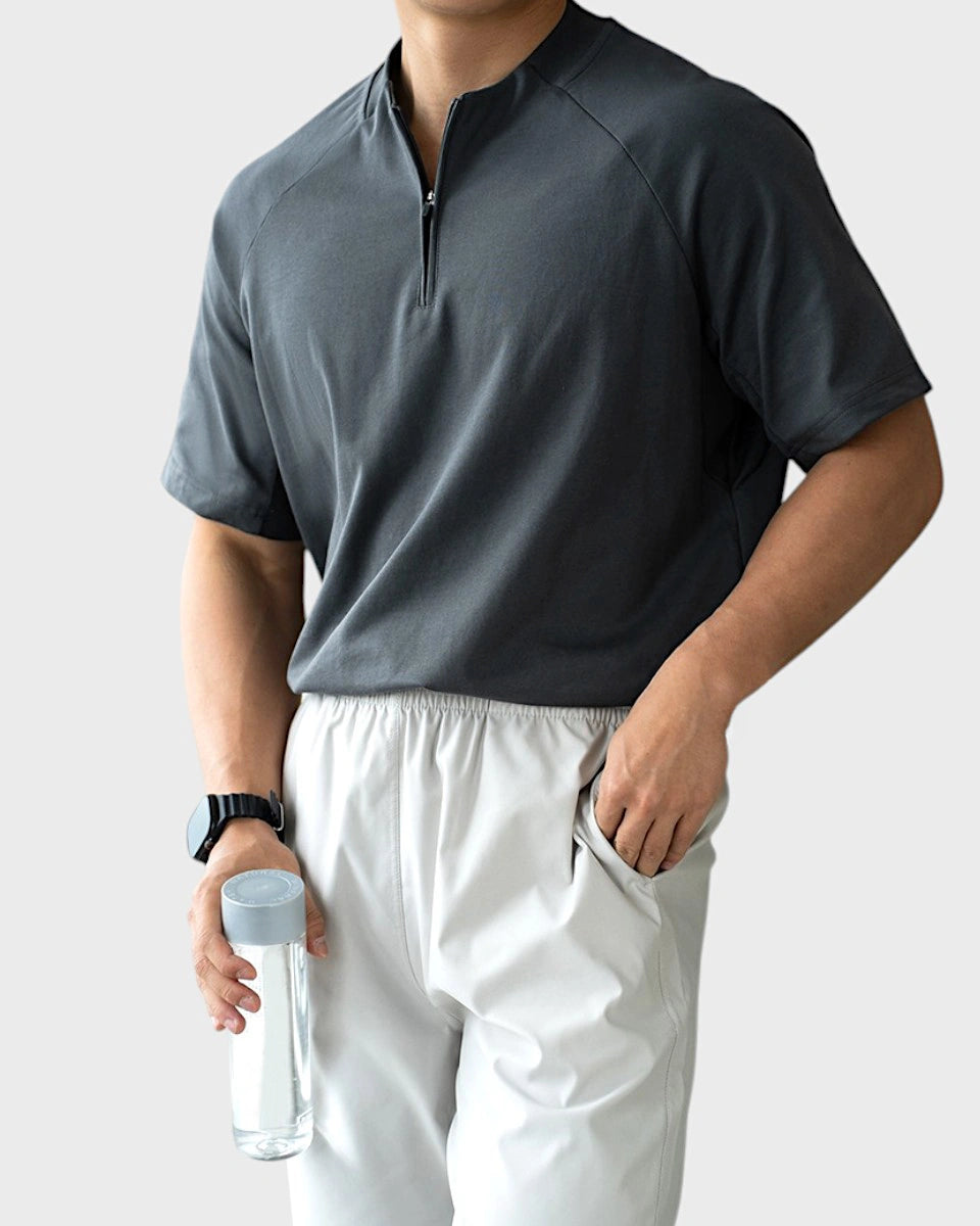 Men’s breathable quarter-zip with mesh underarm for moisture-wicking performance