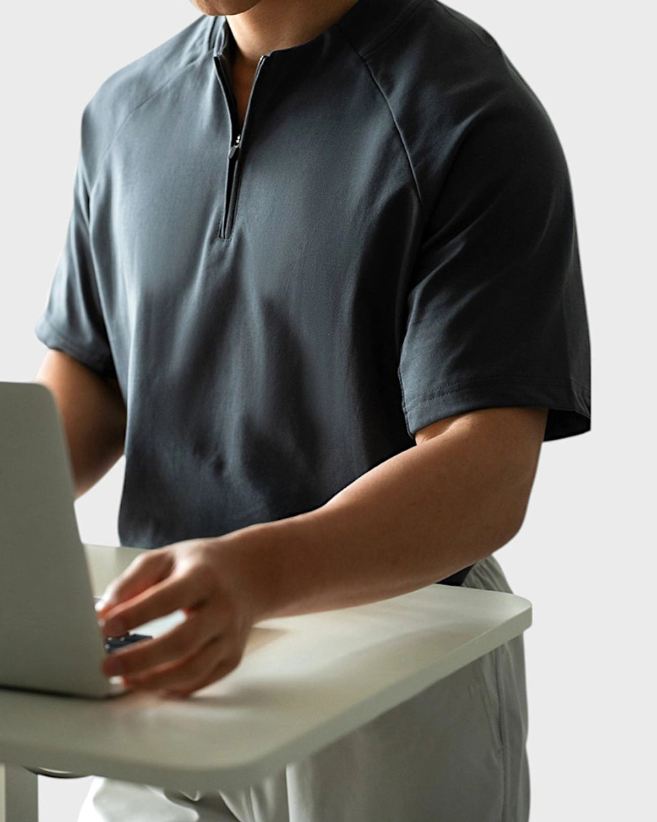 Men’s breathable quarter-zip with mesh underarm for moisture-wicking performance