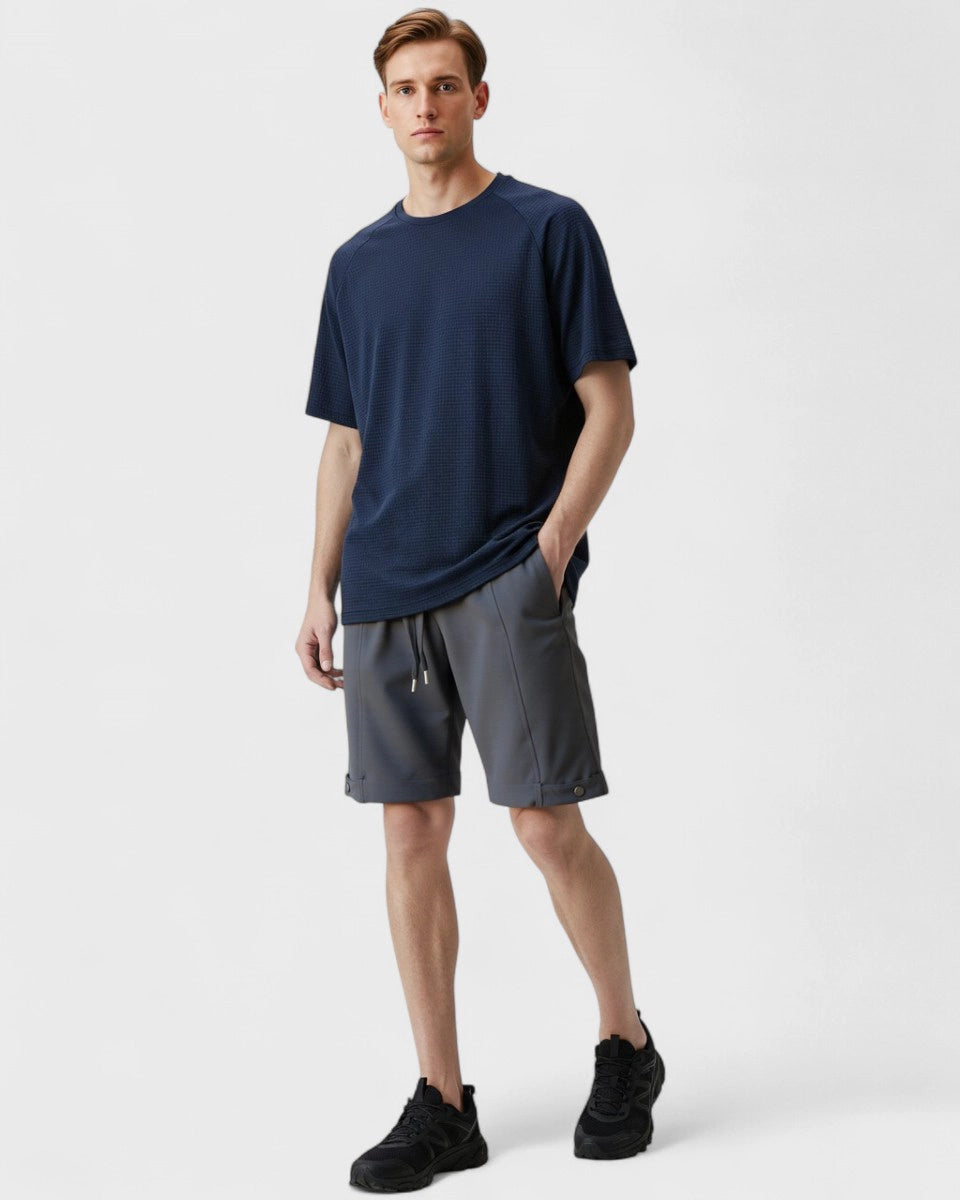 Lightshift Short – lightweight breathable shorts for men with snap button detail and structured silhouette