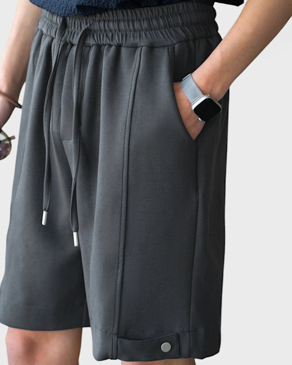 Lightshift Short – lightweight breathable shorts for men with snap button detail and structured silhouette