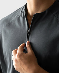 Men’s breathable quarter-zip with mesh underarm for moisture-wicking performance