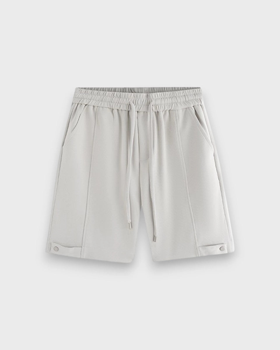 Lightshift Short – lightweight breathable shorts for men with snap button detail and structured silhouette