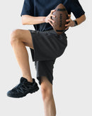 Lightshift Short – lightweight breathable shorts for men with snap button detail and structured silhouette
