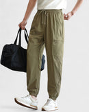 Moisture-wicking jogger pants with elastic waistband and zipper pockets