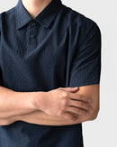 Urbanease Polo – Men’s seersucker polo shirt with breathable fabric and relaxed fit