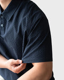 Urbanease Polo – Men’s seersucker polo shirt with breathable fabric and relaxed fit